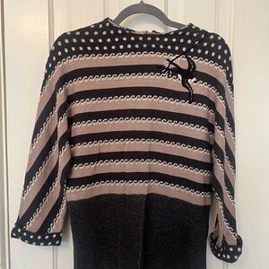 Lia Molly sweater. Charming and unique. Perfect tucked into high waist jeans!